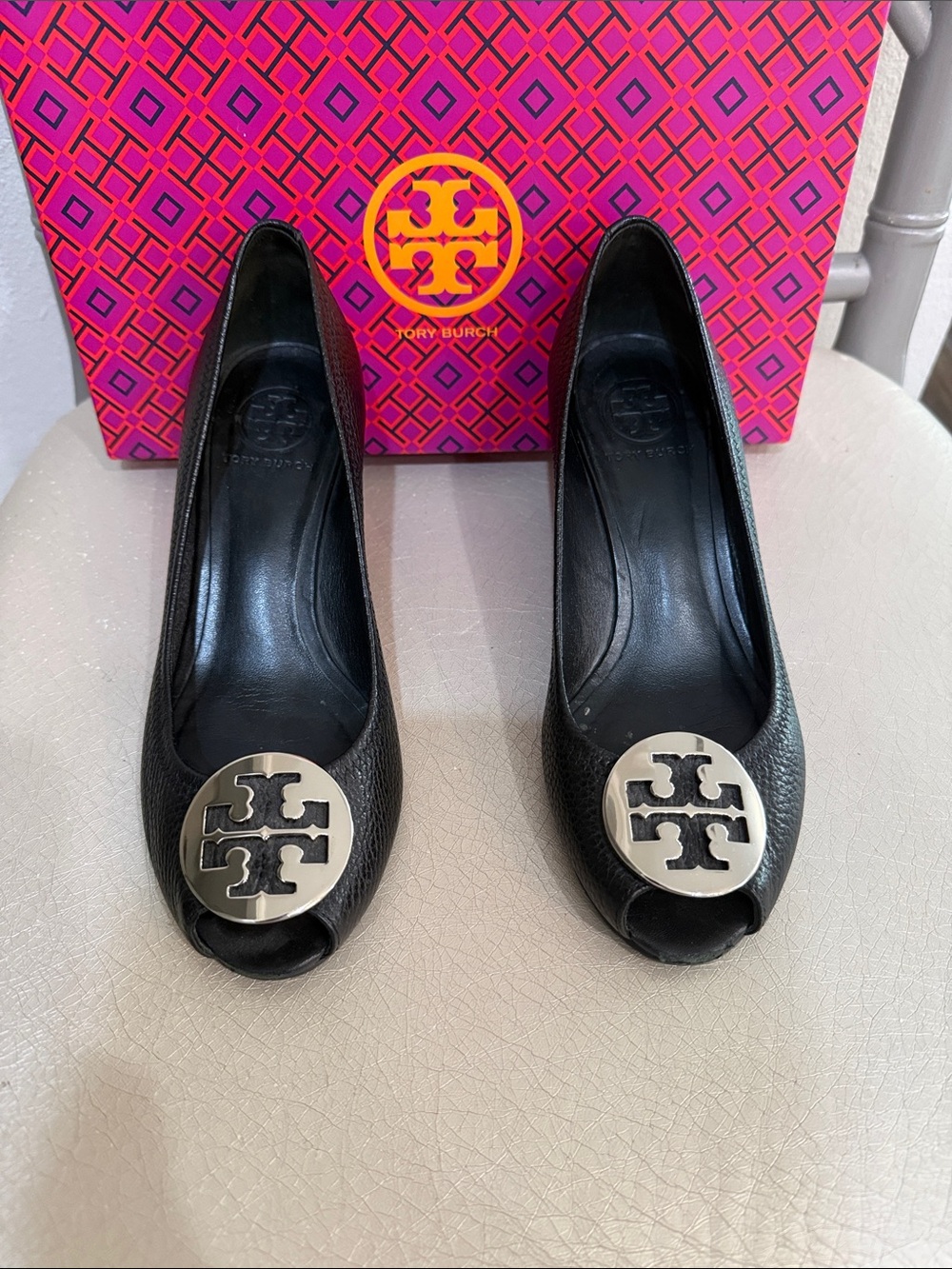 Tory Burch Black Leather Peep-Toe Pumps with Silver Logo Medallion